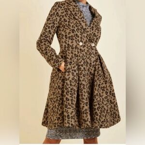 Women’s leopard print jacket, warm, heavy and cinched at the waist.